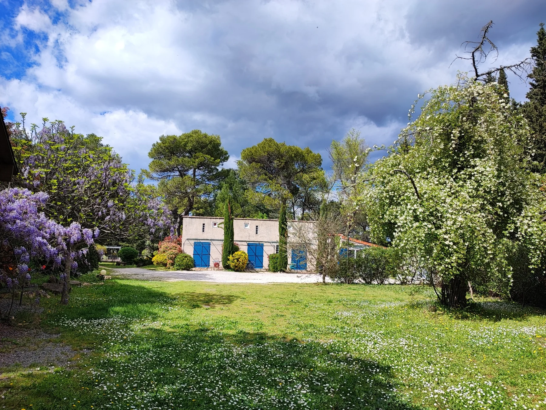 The bedrooms and garden at the mas in Caveirac